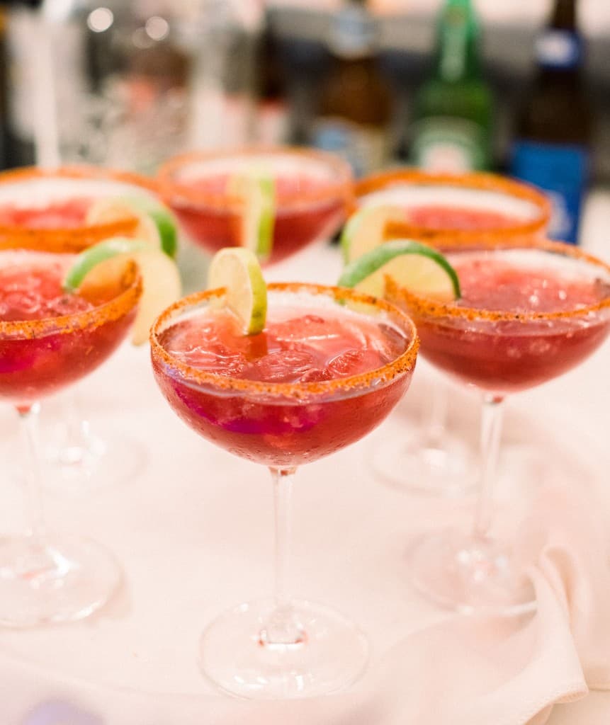 Spicy margaritas with lime garnish