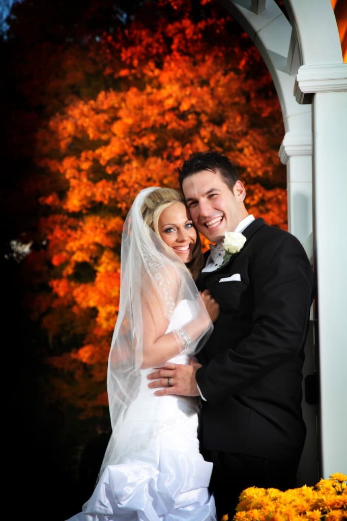 Couple portrait with fall foliage