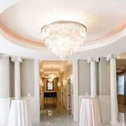 Cocktail hour in the rotunda with crystal chandelier